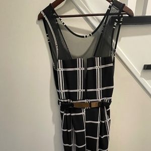 Sexy sleeveless, sheer black jumpsuit